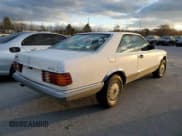 ✅ 1984 Mercedes-Benz 500 • VIN: WDB1260441A061720 • Лот: 93342945. Опубликован ранее на Copart с пробегом 117 508 миль. Бесплатный доступ к архиву аукционных продаж из США и подробный отчёт об истории автомобиля на DreamBid. Изображение 3.