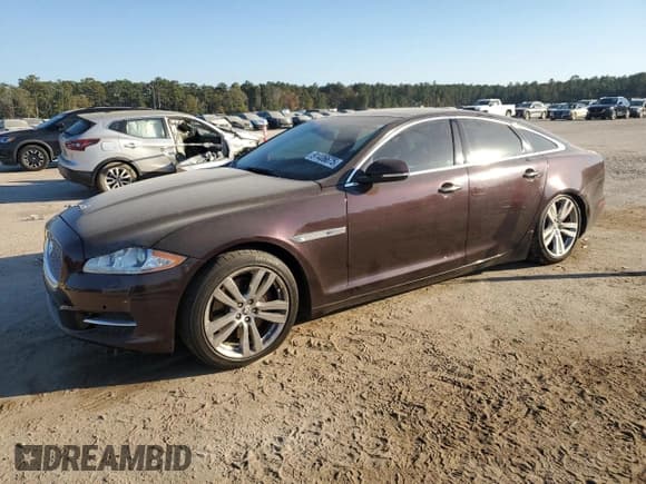 ✅ 2011 Jaguar XJ • VIN: SAJWA1CB6BLV06221 • Lot: 91406675. Listed on Copart with 106,240 mi. Free auction sales archive from the USA and detailed vehicle history report at DreamBid. Image 1.