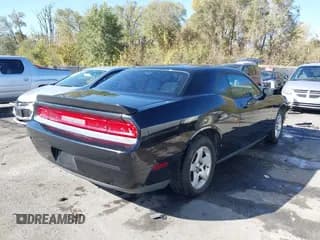 ✅ 2009 Dodge Challenger SE • VIN: 2B3LJ44V89H588439 • Lot: 40663211. Wystawiony na IAAI z przebiegiem 172 655 mil. Bezpłatny archiwum sprzedaży aukcyjnych z USA i szczegółowy raport historii pojazdu na DreamBid. Zdjęcie 4.