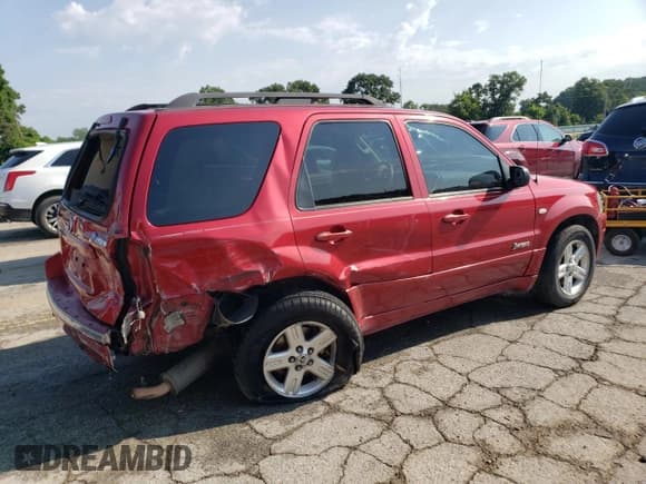 ✅ 2006 Mercury Mariner Hybrid • VIN: 4M2CU98H16KJ16041 • Lot: 62182264. Listed on Copart with 242,209 mi. Free auction sales archive from the USA and detailed vehicle history report at DreamBid. Image 3.