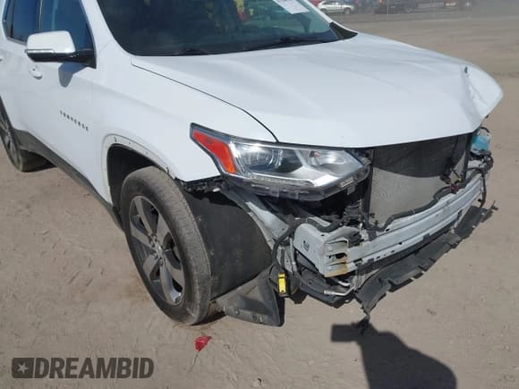 ✅ 2018 Chevrolet Traverse LT • VIN: 1GNEVHKW8JJ132062 • Lot: 43366745. Wystawiony na IAAI z przebiegiem 183 783 mil. Bezpłatny archiwum sprzedaży aukcyjnych z USA i szczegółowy raport historii pojazdu na DreamBid. Zdjęcie 19.