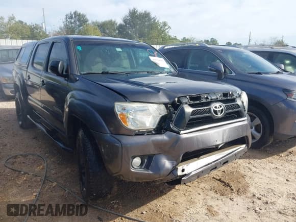 ✅ 2015 Toyota Tacoma • VIN: 5TFLU4EN8FX119895 • Lot: 43670596. Listed on IAAI with 185,866 mi. Free auction sales archive from the USA and detailed vehicle history report at DreamBid. Image 1.