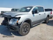 ✅ 2018 Nissan Titan Pro-4X • VIN: 1N6AA1E51JN551695 • Lot: 43365881. Listed on IAAI with 114,790 mi. Free auction sales archive from the USA and detailed vehicle history report at DreamBid. Image 2.
