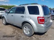 ✅ 2009 Ford Escape Hybrid • VIN: 1FMCU49309KA49573 • Lot: 43052730. Listed on IAAI with 138,496 mi. Free auction sales archive from the USA and detailed vehicle history report at DreamBid. Image 3.