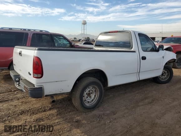 ✅ 1998 Ford F-150 • VIN: 1FTRF17Z9WKC14790 • Lot: 79251964. Listed on Copart with 134,595 mi. Free auction sales archive from the USA and detailed vehicle history report at DreamBid. Image 3.