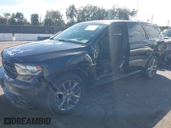 2017 Dodge Durango GT with VIN 1C4RDHDG1HC703120, listed as a IAAI auction lot 43353753 with 190,332 mi miles and . Bid and sale history available at DreamBid. Image 2.