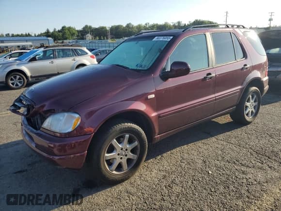 ✅ 1999 Mercedes-Benz M 320/430/500 • VIN: 4JGAB72E4XA088258 • Lot: 66375055. Listed on Copart with 60,613 mi. Free auction sales archive from the USA and detailed vehicle history report at DreamBid. Image 1.