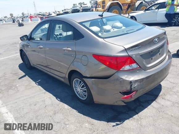 2014 Hyundai Accent GLS with VIN KMHCT4AE8EU655136, listed as a IAAI auction lot 42797016 with 102,554 mi miles and . Bid and sale history available at DreamBid. Image 3.