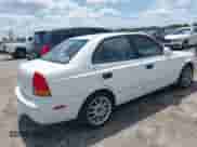 2003 Hyundai Accent GL z VIN KMHCG45C53U468978, wystawiony jako IAAI lot #41999193 z przebiegiem 105 514 mil mil oraz . Historia ofert i sprzedaży dostępna na DreamBid. Obrazek 4.