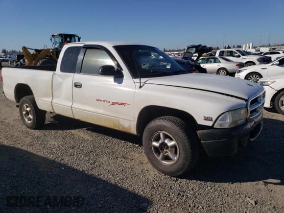 ✅ 1999 Dodge Dakota SLT • VIN: 1B7GG22Y6XS119274 • Lot: 46947005. Wystawiony na Copart z przebiegiem 264 537 mil. Bezpłatny archiwum sprzedaży aukcyjnych z USA i szczegółowy raport historii pojazdu na DreamBid. Zdjęcie 4.