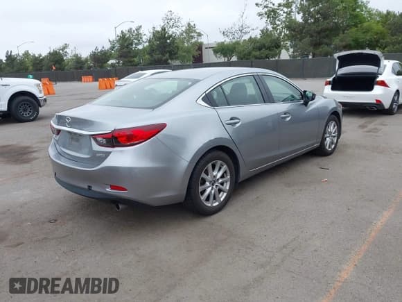 ✅ 2014 Mazda 6 i Sport • VIN: JM1GJ1U60E1135741 • Lot: 42452826. Wystawiony na IAAI z przebiegiem 140 243 mil. Bezpłatny archiwum sprzedaży aukcyjnych z USA i szczegółowy raport historii pojazdu na DreamBid. Zdjęcie 4.