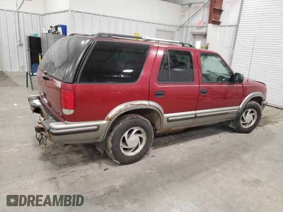 ✅ 1999 Chevrolet Blazer LS • VIN: 1GNDT13W7X2129972 • Lot: 83786284. Wystawiony na Copart z przebiegiem Nie podano. Bezpłatny archiwum sprzedaży aukcyjnych z USA i szczegółowy raport historii pojazdu na DreamBid. Zdjęcie 3.