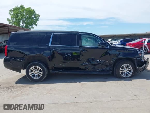 ✅ 2020 Chevrolet Suburban LT • VIN: 1GNSCHKC2LR305366 • Lot: 42080587. Wystawiony na IAAI z przebiegiem 163 540 mil. Bezpłatny archiwum sprzedaży aukcyjnych z USA i szczegółowy raport historii pojazdu na DreamBid. Zdjęcie 13.