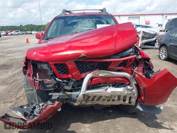 ✅ 2012 Nissan Frontier Pro-4X • VIN: 1N6AD0EV3CC439870 • Lot: 42269470. Listed on IAAI with 165,597 mi. Free auction sales archive from the USA and detailed vehicle history report at DreamBid. Image 12.