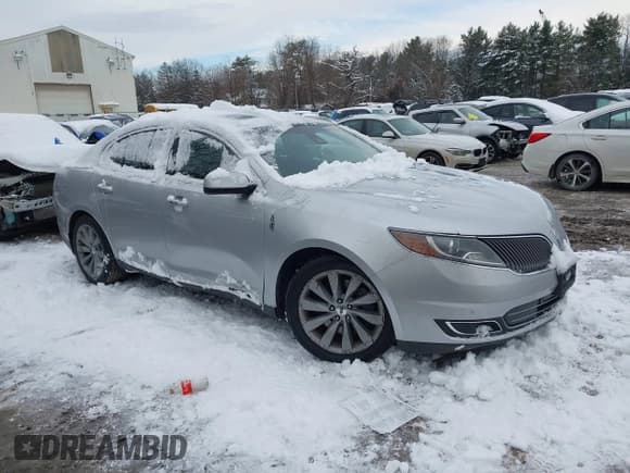 ✅ 2013 Lincoln MKS • VIN: 1LNHL9DK8DG617262 • Lot: 43828421. Listed on IAAI with 122,811 mi. Free auction sales archive from the USA and detailed vehicle history report at DreamBid. Image 1.