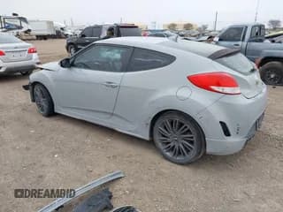 ✅ 2013 Hyundai Veloster w/Black Int • VIN: KMHTC6AD0DU157420 • Lot: 41381813. Wystawiony na IAAI z przebiegiem 163 204 mil. Bezpłatny archiwum sprzedaży aukcyjnych z USA i szczegółowy raport historii pojazdu na DreamBid. Zdjęcie 3.