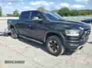 2020 Ram 1500 Rebel z VIN 1C6SRFLM2LN271477, wystawiony jako Copart lot #84295705 z przebiegiem 116 217 mil mil oraz Szkoda całkowita • Salvage title. Historia ofert i sprzedaży dostępna na DreamBid. Obrazek 4.