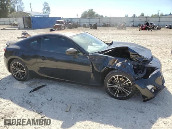 ✅ 2015 Scion FR-S • VIN: JF1ZNAA11F9705728 • Лот: 89929845. Опубликован ранее на Copart с пробегом 101 092 миль. Бесплатный доступ к архиву аукционных продаж из США и подробный отчёт об истории автомобиля на DreamBid. Изображение 4.