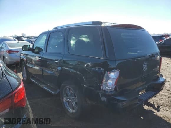 ✅ 2006 Cadillac Escalade • VIN: 1GYEK63NX6R145359 • Lot: 46592015. Listed on Copart with 223,062 mi. Free auction sales archive from the USA and detailed vehicle history report at DreamBid. Image 2.
