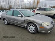 ✅ 2001 Nissan Maxima GXE • VIN: JN1CA31DX1T818870 • Lot: 93910225. Listed on Copart with 149,515 mi. Free auction sales archive from the USA and detailed vehicle history report at DreamBid. Image 4.