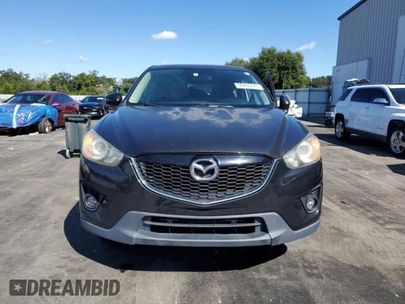 ✅ 2013 Mazda CX-5 Grand Touring • VIN: JM3KE4DE0D0150890 • Lot: 90800845. Wystawiony na Copart z przebiegiem 132 226 mil. Bezpłatny archiwum sprzedaży aukcyjnych z USA i szczegółowy raport historii pojazdu na DreamBid. Zdjęcie 5.