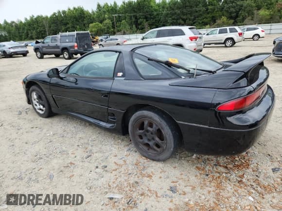 ✅ 1997 Mitsubishi 3000GT • VIN: JA3AM44H8VY001890 • Lot: 67676365. Listed on Copart with 156,252 mi. Free auction sales archive from the USA and detailed vehicle history report at DreamBid. Image 2.