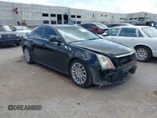 ✅ 2012 Cadillac CTS Premium • VIN: 1G6DP5E35C0129694 • Lot: 42643500. Listed on IAAI with 187,071 mi. Free auction sales archive from the USA and detailed vehicle history report at DreamBid. Image 1.