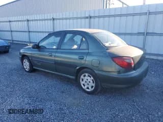 ✅ 2002 Kia Rio • VIN: KNADC123226128937 • Lot: 89225035. Listed on Copart with 218,436 mi. Free auction sales archive from the USA and detailed vehicle history report at DreamBid. Image 2.