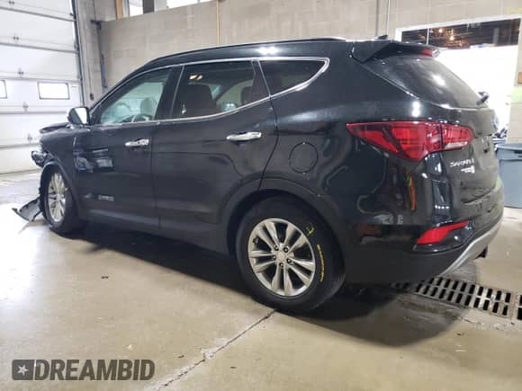 2017 Hyundai Santa Fe 2.0T z VIN 5XYZUDLA2HG435261, wystawiony jako Copart lot #68190485 z przebiegiem 125 513 mil mil oraz Szkoda całkowita • Salvage title. Historia ofert i sprzedaży dostępna na DreamBid. Obrazek 2.