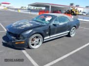 ✅ 2009 Ford Mustang • VIN: 1ZVHT84N695138086 • Lot: 42166009. Wystawiony na IAAI z przebiegiem 92 518 mil. Bezpłatny archiwum sprzedaży aukcyjnych z USA i szczegółowy raport historii pojazdu na DreamBid. Zdjęcie 2.