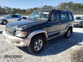 ✅ 2002 Isuzu Trooper S • VIN: JACDS58XX27J00836 • Lot: 48750285. Listed on Copart with 221,177 mi. Free auction sales archive from the USA and detailed vehicle history report at DreamBid. Image 1.