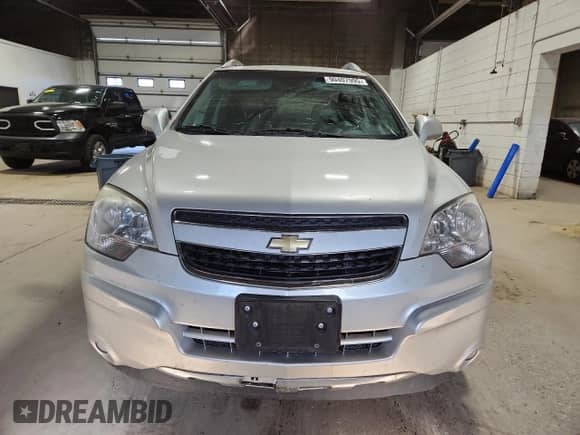 2012 Chevrolet Captiva Sport LTZ with VIN 3GNFL4E59CS592869, listed as a Copart auction lot 90407995 with 174,518 mi miles and Clean title. Bid and sale history available at DreamBid. Image 5.