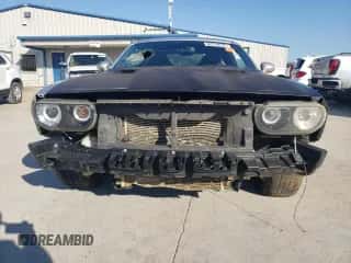 2009 Dodge Challenger SRT-8 z VIN 2B3LJ74W29H563241, wystawiony jako Copart lot #73367354 z przebiegiem Nie podano mil oraz Czysty tytuł • Clean title. Historia ofert i sprzedaży dostępna na DreamBid. Obrazek 5.