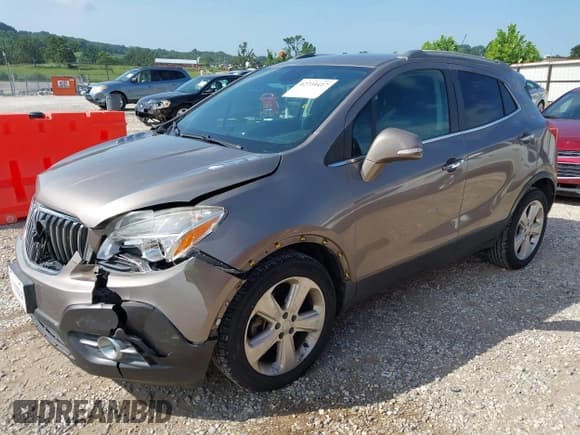✅ 2015 Buick Encore Leather • VIN: KL4CJCSB4FB121633 • Lot: 42739417. Listed on IAAI with 80,998 mi. Free auction sales archive from the USA and detailed vehicle history report at DreamBid. Image 2.