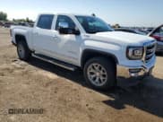 ✅ 2018 GMC Sierra 1500 SLT • VIN: 3GTU2NEC5JG571931 • Лот: 70195255. Опубликован ранее на Copart с пробегом 94 194 миль. Бесплатный доступ к архиву аукционных продаж из США и подробный отчёт об истории автомобиля на DreamBid. Изображение 4.