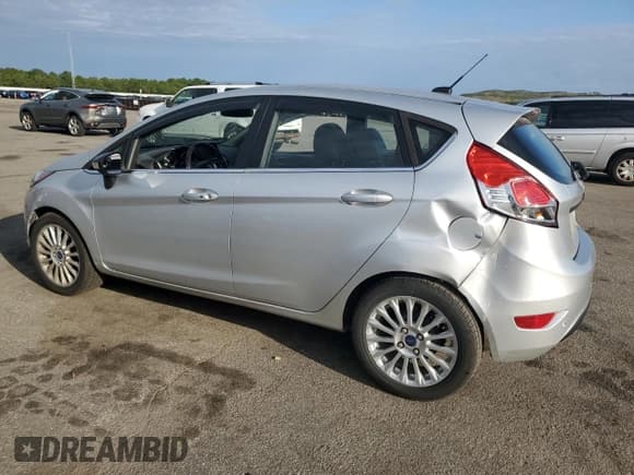 ✅ 2014 Ford Fiesta Titanium • VIN: 3FADP4FJ7EM179572 • Лот: 80505475. Опубликован ранее на Copart с пробегом 186 633 миль. Бесплатный доступ к архиву аукционных продаж из США и подробный отчёт об истории автомобиля на DreamBid. Изображение 2.