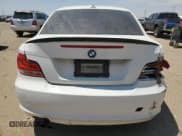 ✅ 2013 BMW 1 Series 128i • VIN: WBAUP7C54DVP25118 • Lot: 67860225. Listed on Copart with 94,358 mi. Free auction sales archive from the USA and detailed vehicle history report at DreamBid. Image 6.