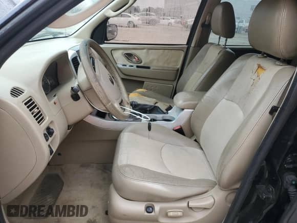 2006 Mercury Mariner Luxury с VIN 4M2YU561X6KJ11487, выставлен на аукционе Copart как лот 42571955 с пробегом 184 935 миль миль и Списание • Salvage title. История ставок и продаж доступна на DreamBid. Изображение 7.