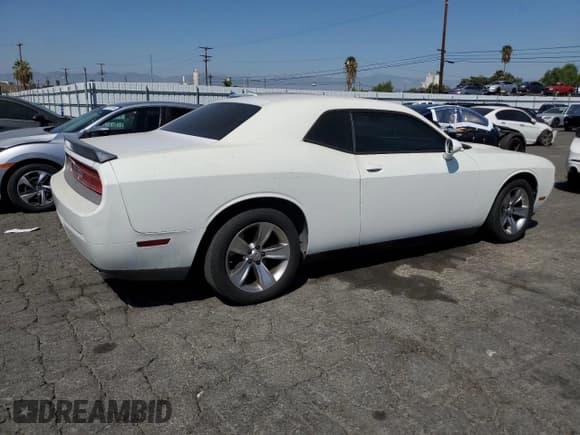 ✅ 2013 Dodge Challenger SXT • VIN: 2C3CDYAG0DH607761 • Lot: 72912064. Wystawiony na Copart z przebiegiem 194 631 mil. Bezpłatny archiwum sprzedaży aukcyjnych z USA i szczegółowy raport historii pojazdu na DreamBid. Zdjęcie 3.