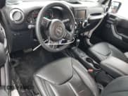 ✅ 2015 Jeep Wrangler Rubicon Hard Rock • VIN: 1C4BJWCG8FL713138 • Лот: 89868115. Опубликован ранее на Copart с пробегом 83 894 миль. Бесплатный доступ к архиву аукционных продаж из США и подробный отчёт об истории автомобиля на DreamBid. Изображение 8.