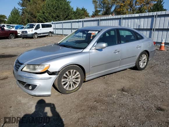 2011 Hyundai Azera GLS с VIN KMHFC4DD9BA532992, выставлен на аукционе Copart как лот 89530105 с пробегом 211 041 миль миль и Списание • Salvage title. История ставок и продаж доступна на DreamBid. Изображение 1.