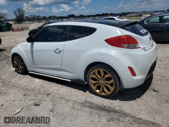 ✅ 2013 Hyundai Veloster w/Gray Int • VIN: KMHTC6AD5DU171622 • Lot: 59761464. Wystawiony na Copart z przebiegiem 85 424 mil. Bezpłatny archiwum sprzedaży aukcyjnych z USA i szczegółowy raport historii pojazdu na DreamBid. Zdjęcie 2.