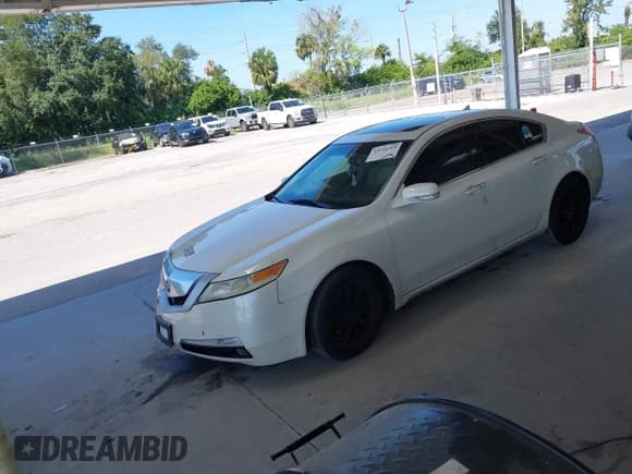 ✅ 2009 Acura TL Technology • VIN: 19UUA86569A009102 • Lot: 43516160. Listed on IAAI with 166,366 mi. Free auction sales archive from the USA and detailed vehicle history report at DreamBid. Image 2.