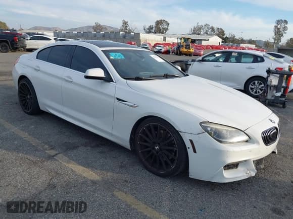 ✅ 2013 BMW 6 Series 650i • VIN: WBA6B2C53DDG66937 • Lot: 41602666. Listed on IAAI with 114,861 mi. Free auction sales archive from the USA and detailed vehicle history report at DreamBid. Image 1.