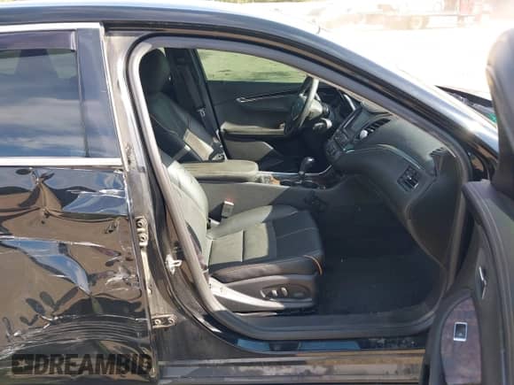 2014 Chevrolet Impala LT z VIN 1G1125S32EU152096, wystawiony jako IAAI lot #43431111 z przebiegiem 122 494 mil mil oraz . Historia ofert i sprzedaży dostępna na DreamBid. Obrazek 5.