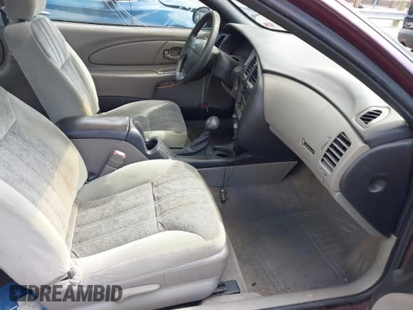 ✅ 2004 Chevrolet Monte Carlo LS • VIN: 2G1WW12E449150625 • Lot: 42233629. Listed on IAAI with 163,914 mi. Free auction sales archive from the USA and detailed vehicle history report at DreamBid. Image 5.