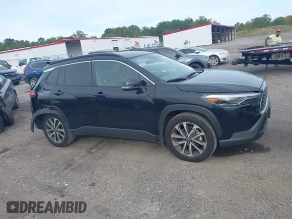 ✅ 2023 Toyota Corolla Cross XLE • VIN: 7MUDAABG2PV078789 • Lot: 43316110. Listed on IAAI with 18,307 mi. Free auction sales archive from the USA and detailed vehicle history report at DreamBid. Image 13.