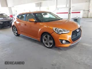 ✅ 2013 Hyundai Veloster Turbo • VIN: KMHTC6AE2DU178083 • Lot: 43039378. Wystawiony na IAAI z przebiegiem 126 260 mil. Bezpłatny archiwum sprzedaży aukcyjnych z USA i szczegółowy raport historii pojazdu na DreamBid. Zdjęcie 1.
