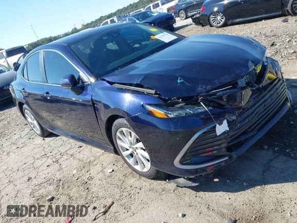 2021 Toyota Camry LE with VIN 4T1C11AK8MU461036, listed as a IAAI auction lot 43351796 with 83,856 mi miles and . Bid and sale history available at DreamBid. Image 1.