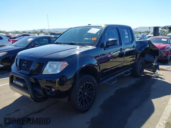 ✅ 2017 Nissan Frontier SV • VIN: 1N6AD0EV7HN715656 • Lot: 43472468. Wystawiony na IAAI z przebiegiem 142 490 mil. Bezpłatny archiwum sprzedaży aukcyjnych z USA i szczegółowy raport historii pojazdu na DreamBid. Zdjęcie 17.